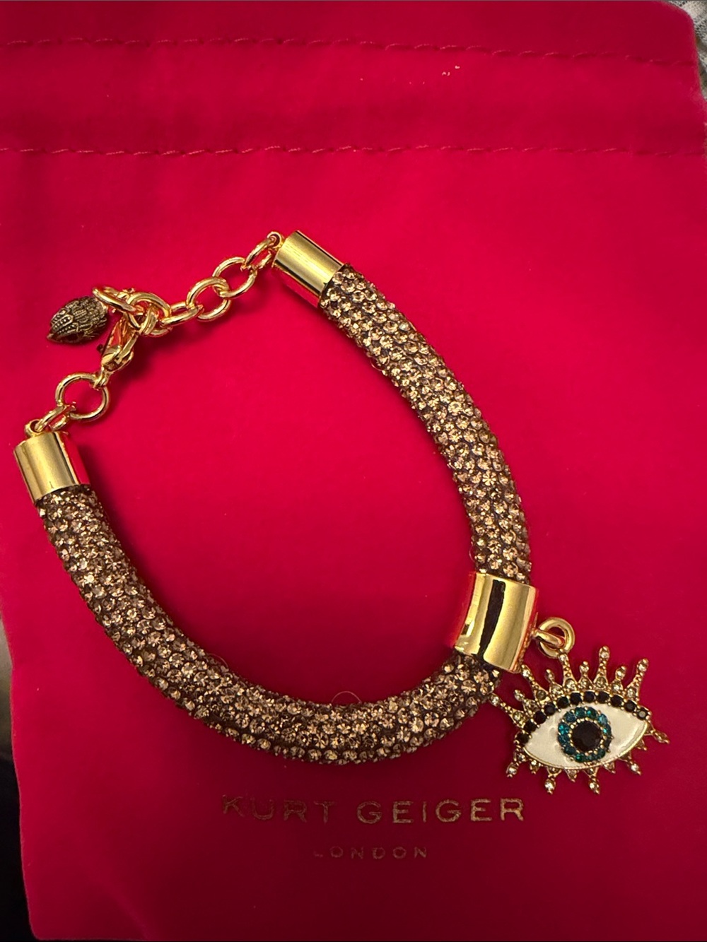 Kurt Geiger Gold Crystal Rope Bracelet with Evil Eye Charm